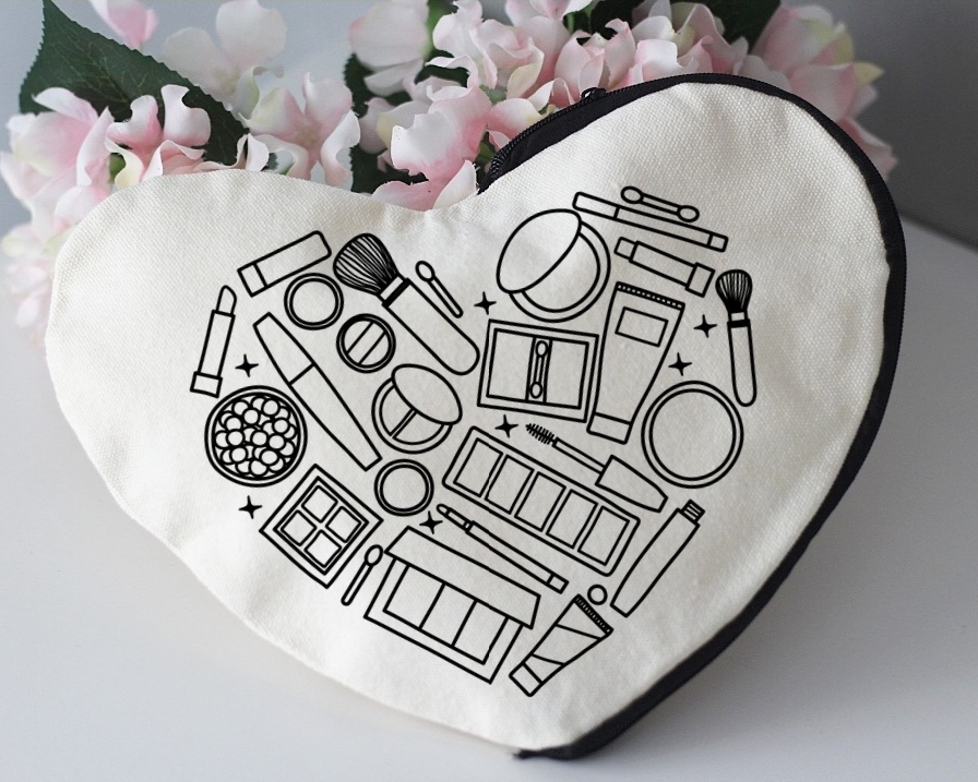 Herzförmige Kosmetiktasche mit Makeup Motiv